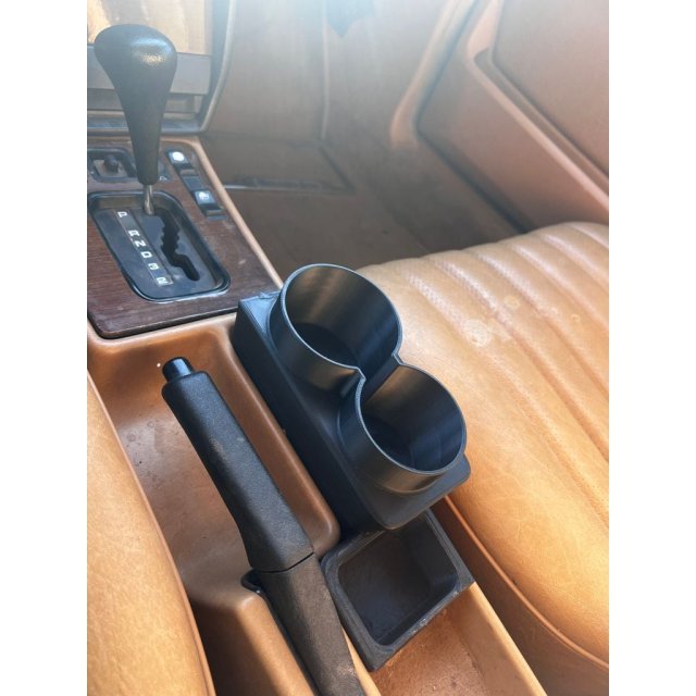 Cup Holder Front Position with Armrest Clearance — source image