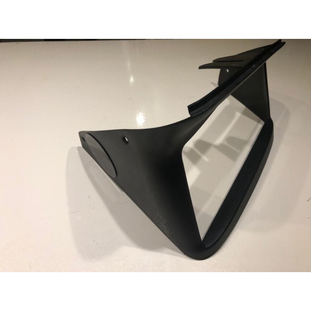 Headlight Bezel Plug — source image