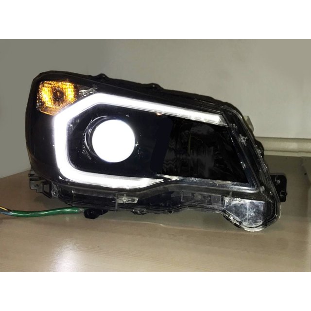 Headlight housing extender for 3" Hella E55 bi-xenon projector retrofit — source image