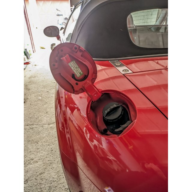 Gas Cap Holder — source image
