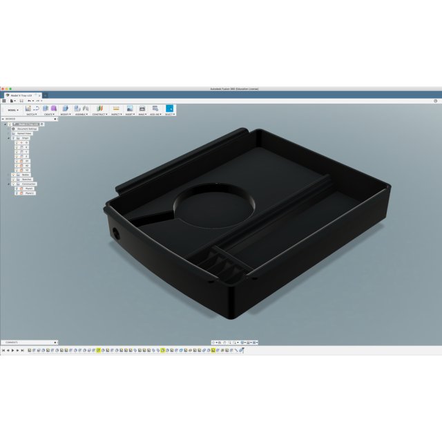 Tesla Model S & X coing tray with QI — source image