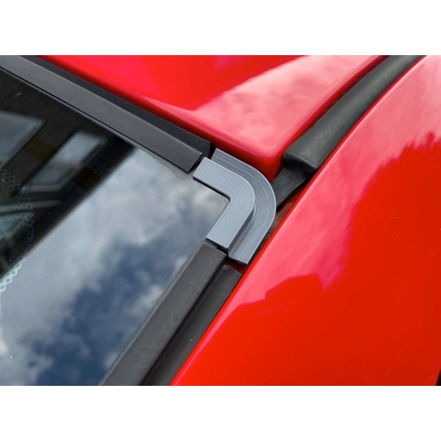 Rear window corner trim piece — source image
