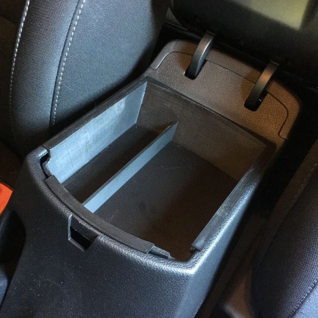 Center Armrest Secondary Storage — source image