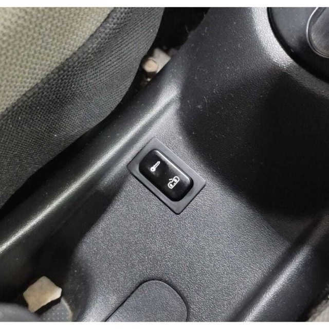 Central door lock switch bezel — source image