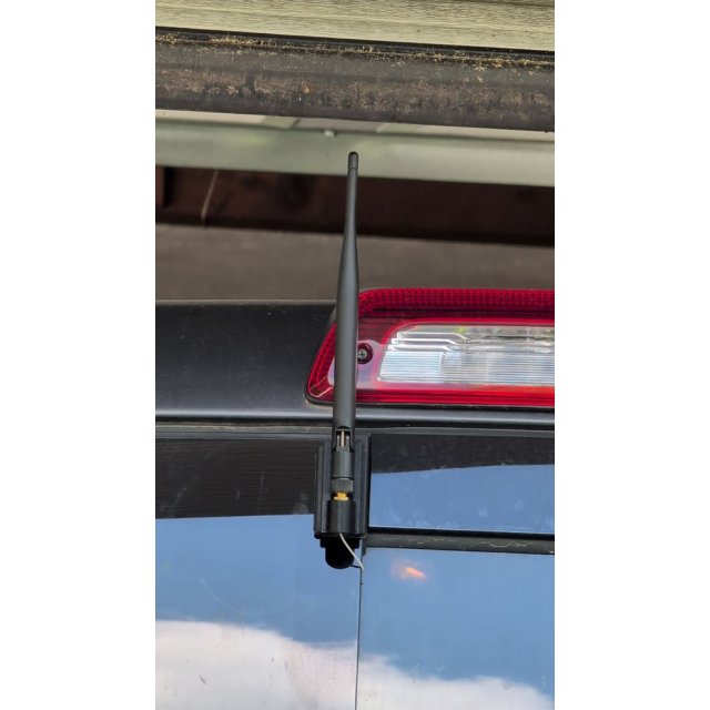 Truck rear window antenna mount SMA connector. — source image