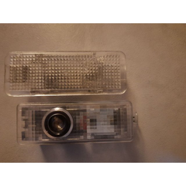 Door courtesy light projector adapter — source image