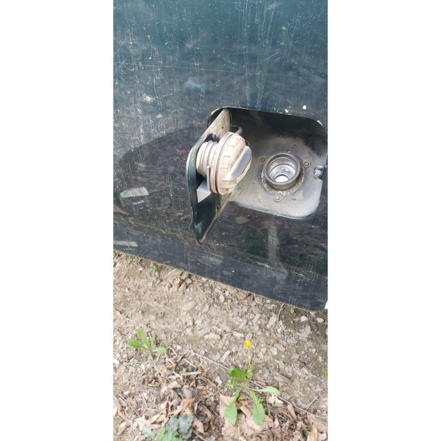 Gas Cap Holder — source image