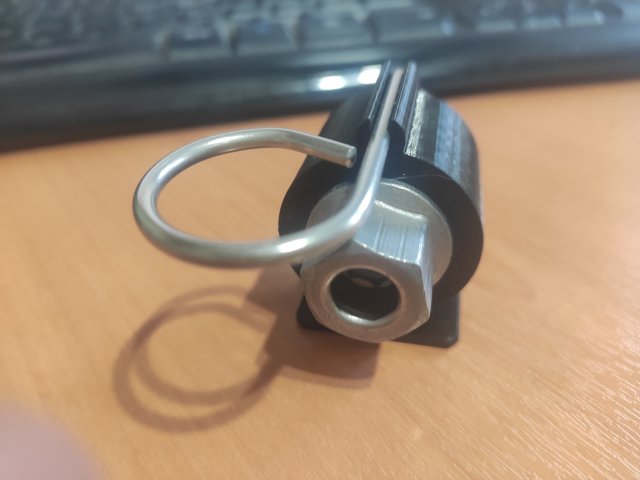 Underseat Container for Wheel Lock Key — source image