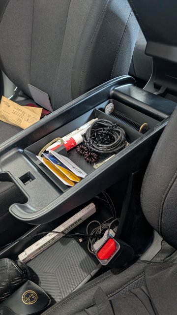 middle console with coin holder — source image