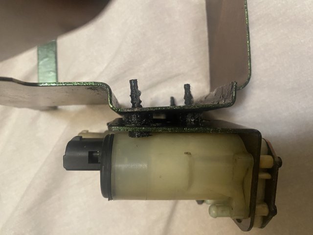 Washer Pump Holder — source image